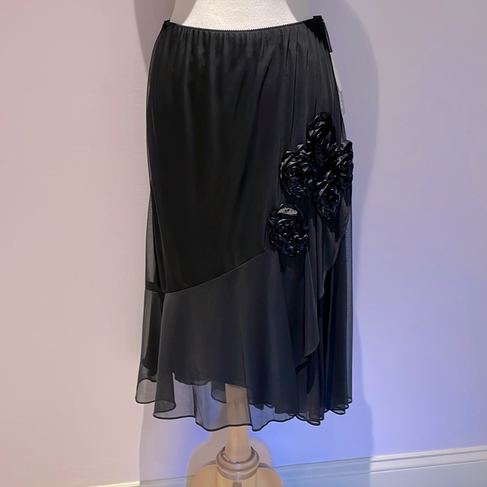 Black skirt with rosette accents